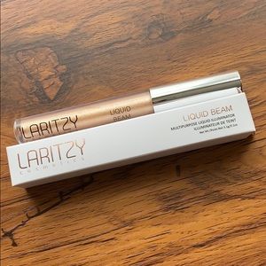 Laritzy Liquid Illuminator in Topaz